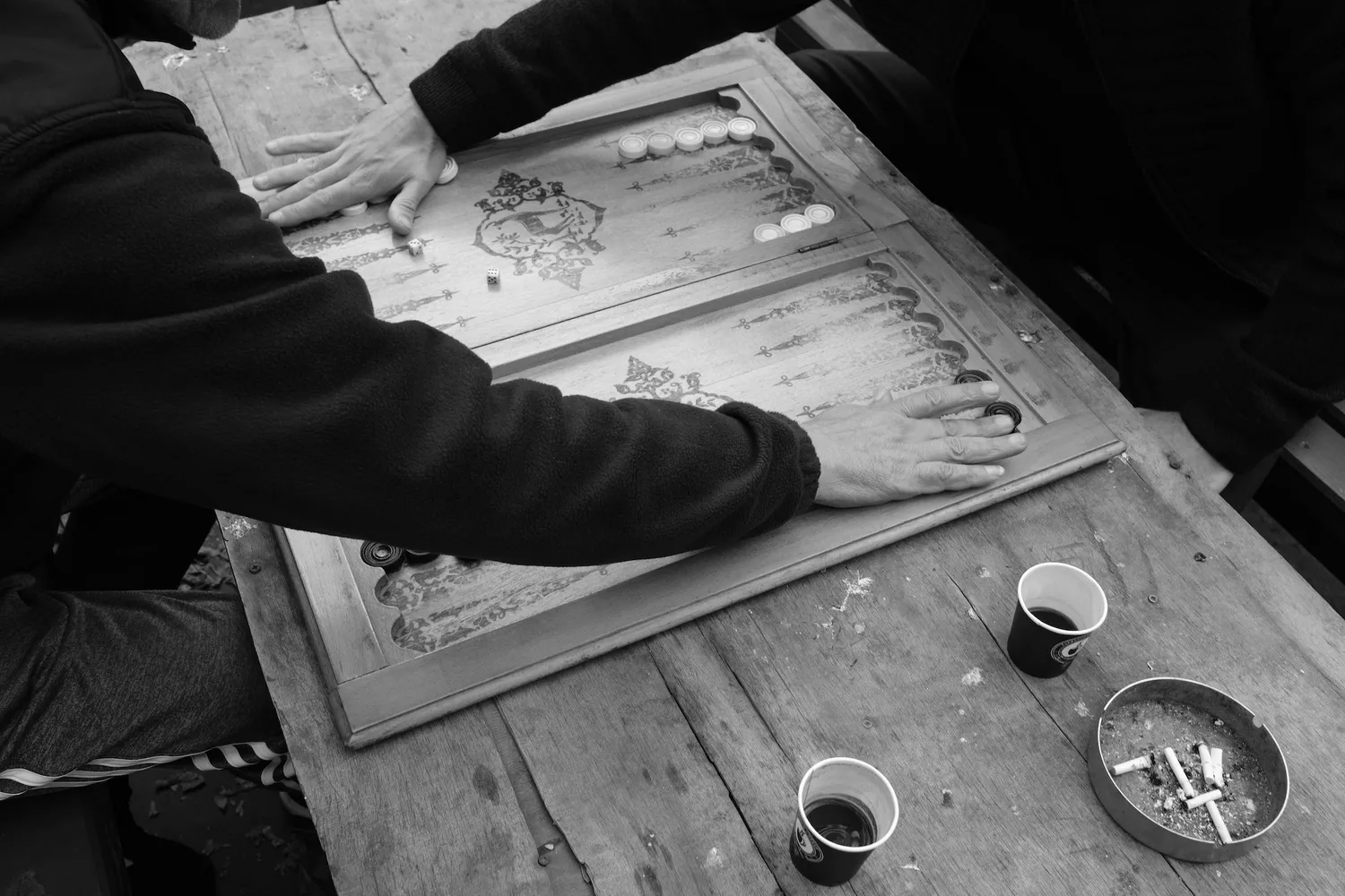 Men playing backgammon
