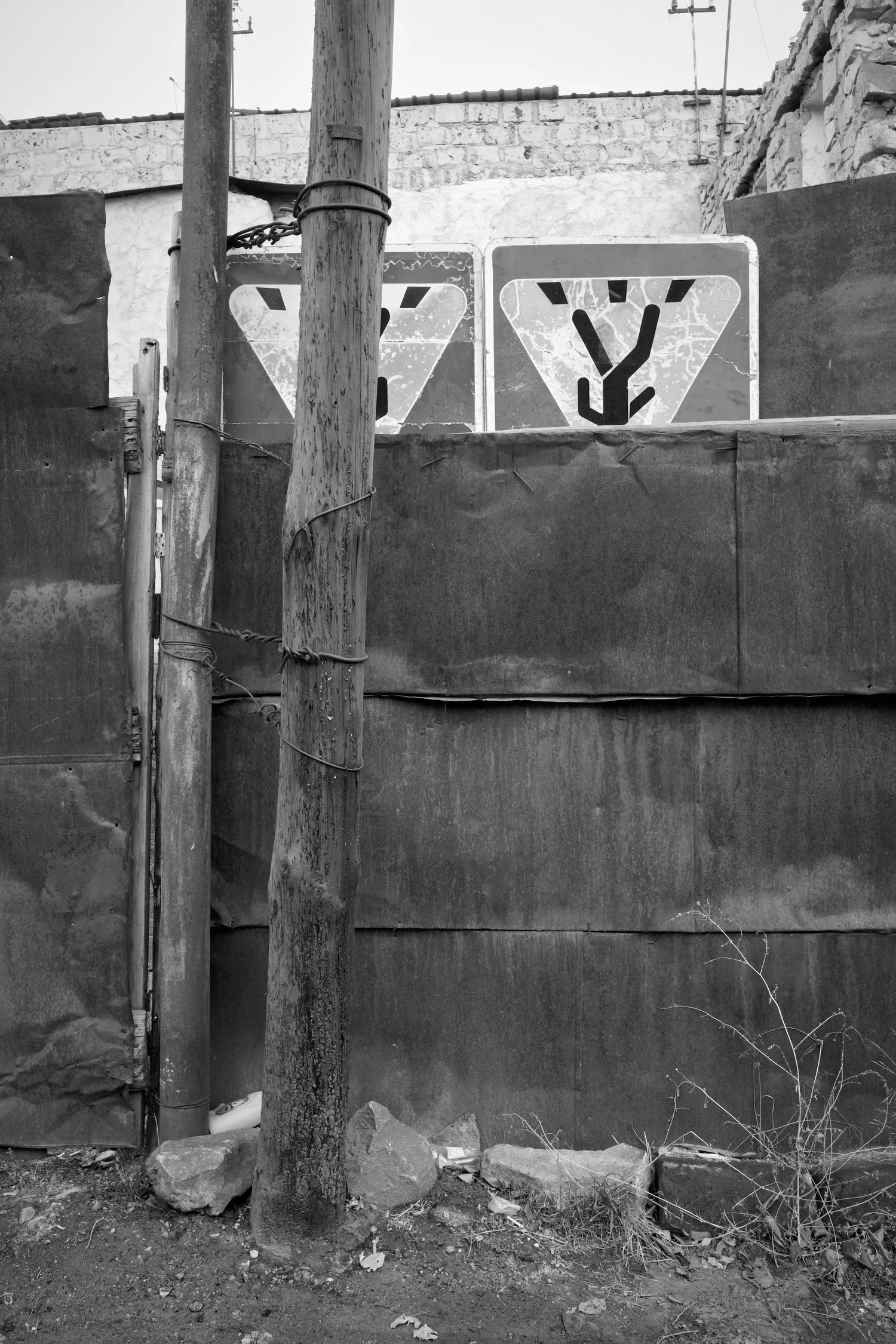A man creates a shelter for his house using road signs – Yerevan