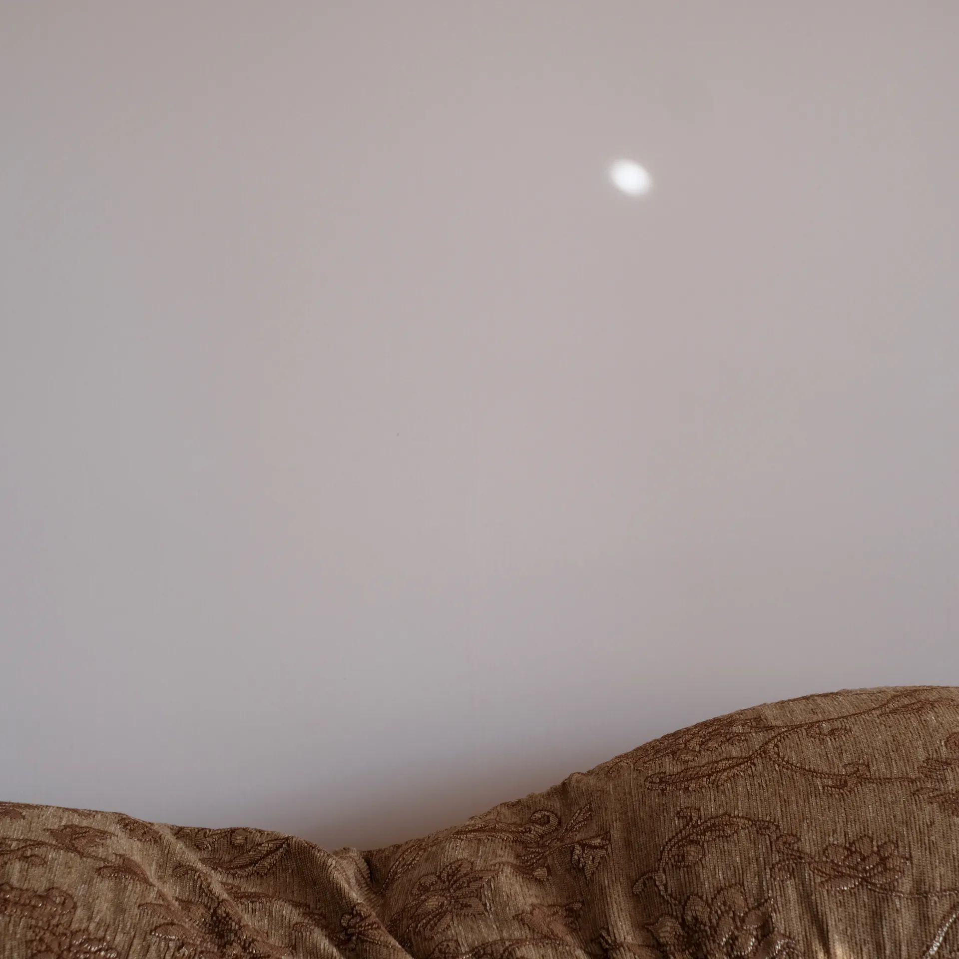 A sofa in which I saw the curves of the arid Armenian landscapes